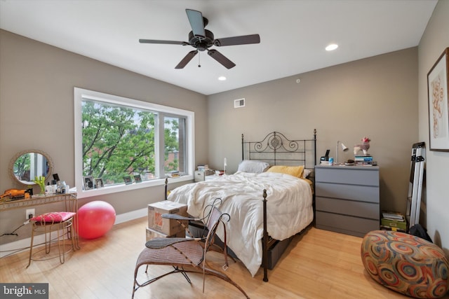 bedroom featuring ceiling fan and wood-type flooring