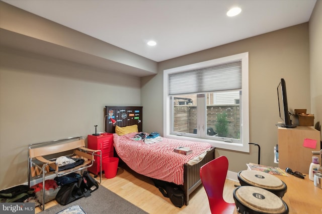 bedroom with light wood-type flooring