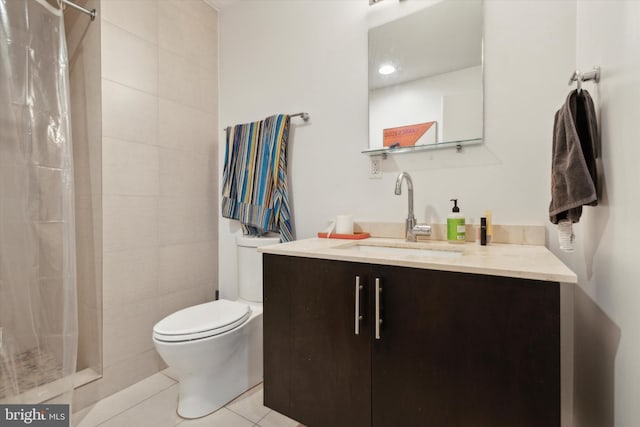 bathroom featuring vanity, toilet, curtained shower, and tile patterned floors