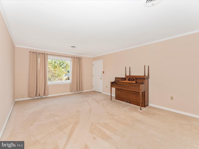 carpeted spare room with ornamental molding