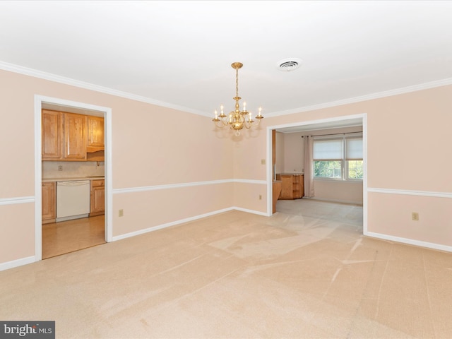 carpeted empty room featuring crown molding and a chandelier