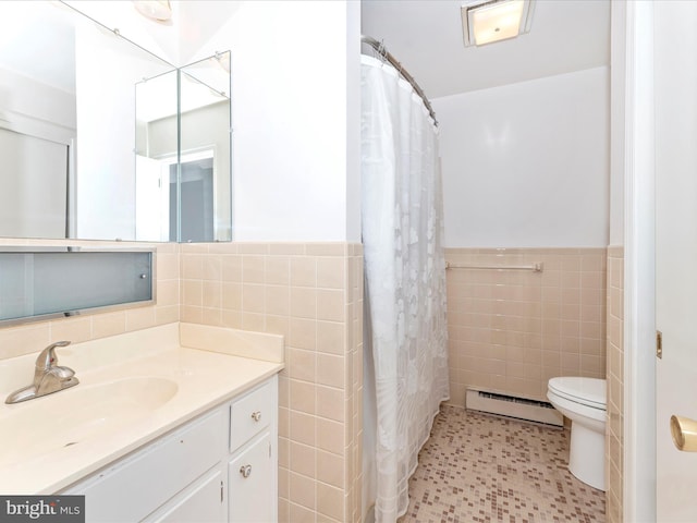 bathroom with toilet, walk in shower, vanity, a baseboard radiator, and tile walls