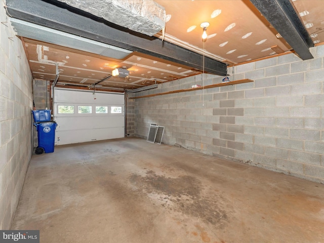 garage featuring a garage door opener