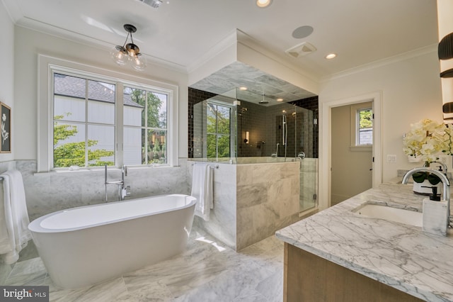 bathroom with vanity, crown molding, tile walls, a chandelier, and plus walk in shower