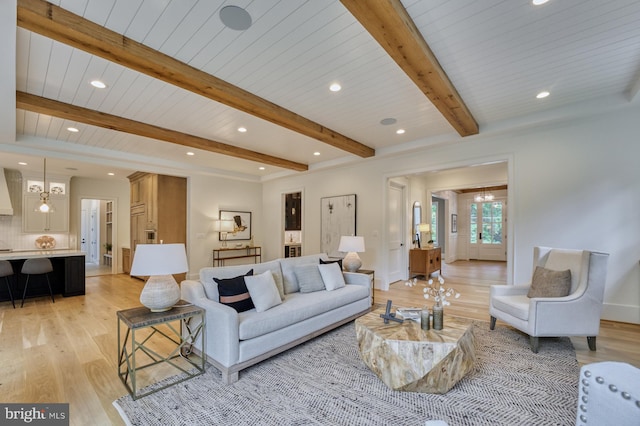 living room with wooden ceiling, beam ceiling, and light hardwood / wood-style floors