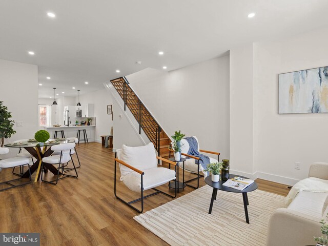 living room with hardwood / wood-style flooring