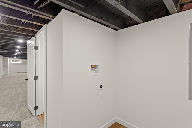 laundry area featuring washer hookup, hookup for an electric dryer, and light colored carpet