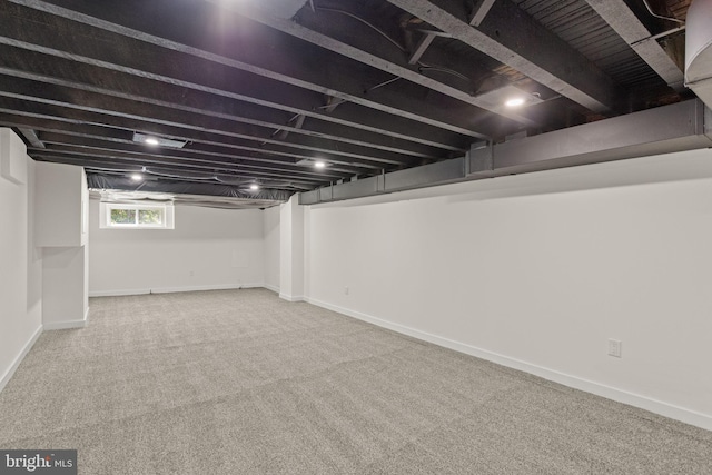 basement with carpet flooring