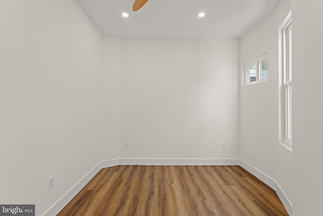 unfurnished room featuring ceiling fan and wood-type flooring