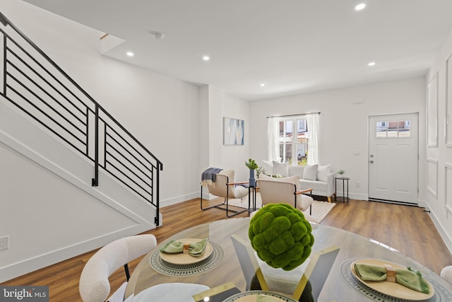 dining room with hardwood / wood-style floors