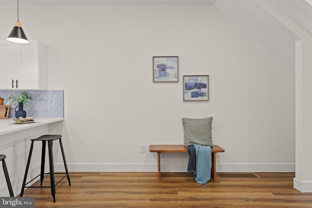 living area featuring hardwood / wood-style floors