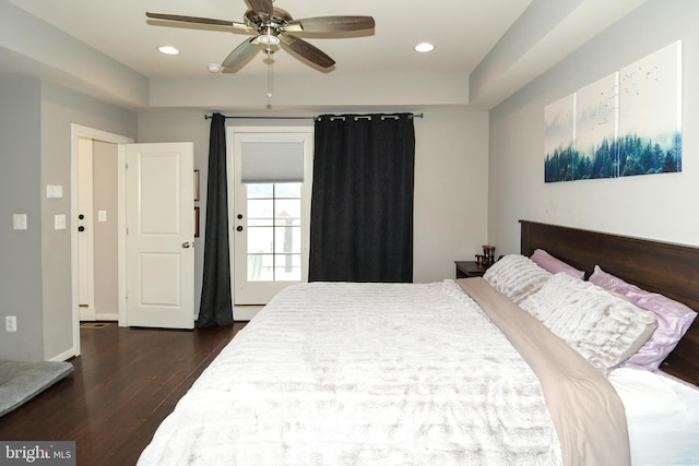 bedroom featuring dark hardwood / wood-style floors and ceiling fan