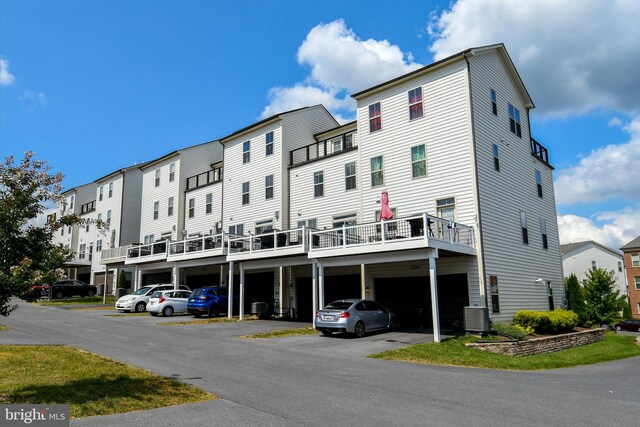 view of building exterior featuring central AC unit