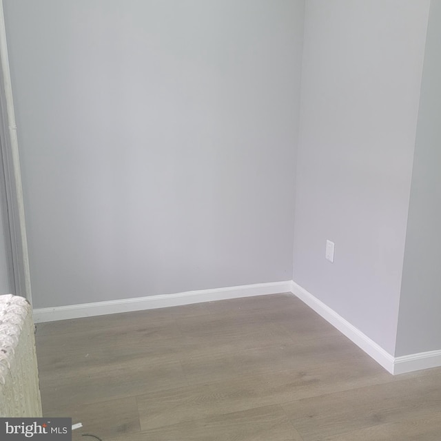 4111 N 8th St, Philadelphia, PA 19140 - spare room featuring baseboards and light wood-type flooring