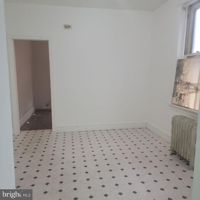 4111 N 8th St, Philadelphia, PA 19140 - spare room featuring radiator heating unit and baseboards