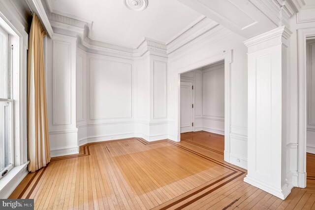 unfurnished room featuring light hardwood / wood-style floors