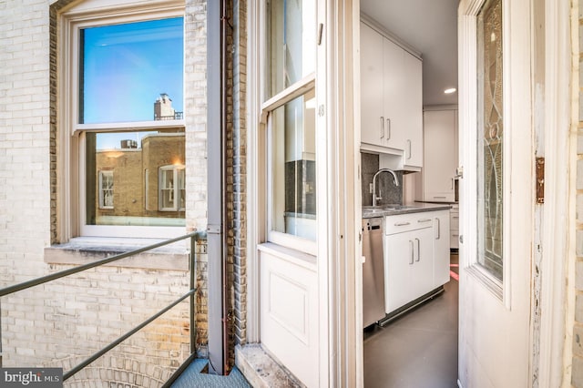 doorway to property with sink