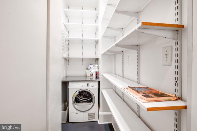 laundry room with washer / dryer