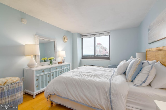 bedroom featuring light wood-type flooring