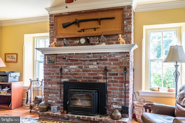 room details featuring wood-type flooring, a fireplace, and ornamental molding