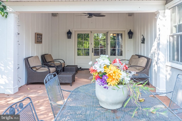 exterior space featuring ceiling fan and a wooden deck