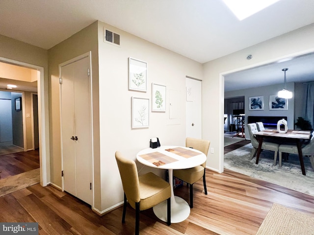 dining room featuring hardwood / wood-style flooring