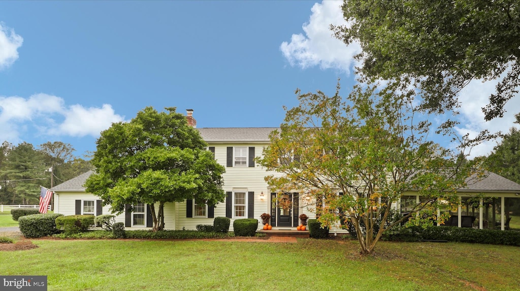 colonial house with a front yard