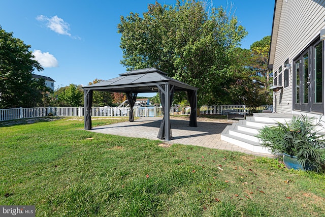 view of yard featuring a gazebo and a patio area