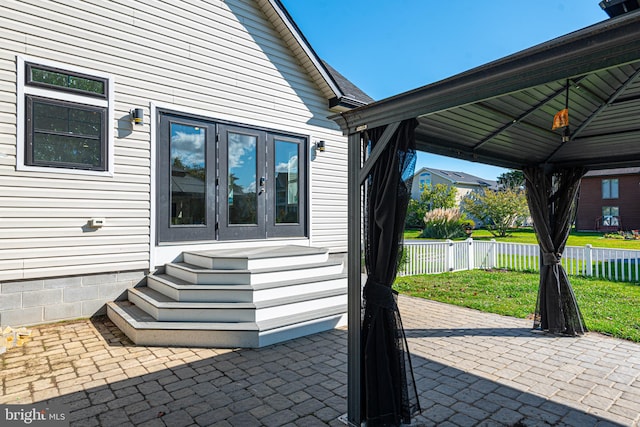 view of patio / terrace with french doors and a gazebo