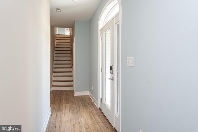 hallway featuring light hardwood / wood-style flooring