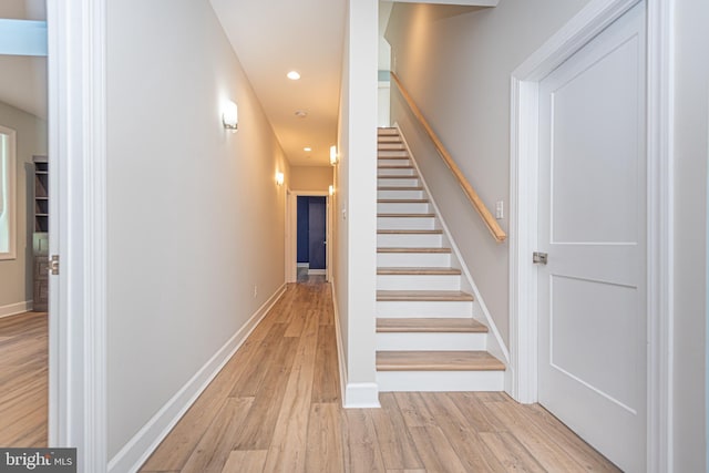 stairway with wood-type flooring