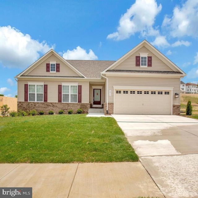 view of front of property featuring a front yard, an attached garage, brick siding, and driveway