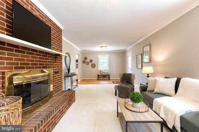 living room with ornamental molding, hardwood / wood-style floors, and a brick fireplace