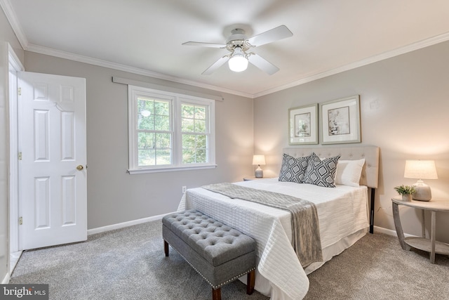 carpeted bedroom featuring crown molding and ceiling fan