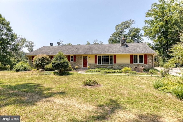 ranch-style home featuring a front yard