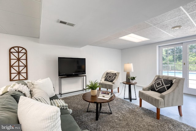 living room featuring concrete floors