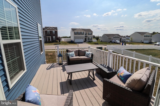 deck featuring outdoor lounge area