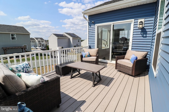 deck with an outdoor hangout area