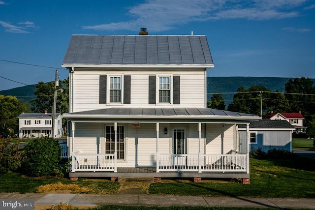 farmhouse with a porch