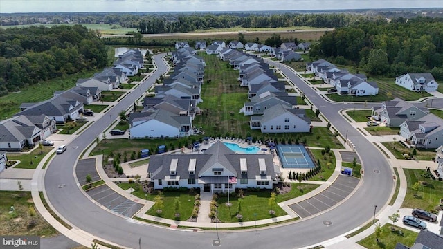 bird's eye view with a residential view and a water view