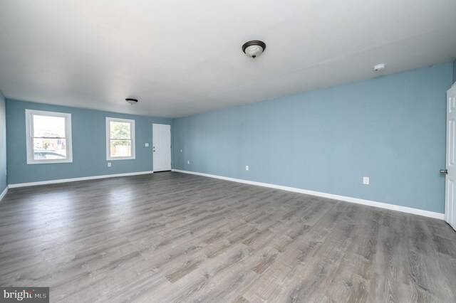 spare room with light hardwood / wood-style floors