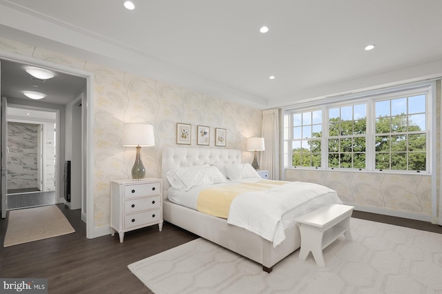 bedroom featuring dark hardwood / wood-style flooring