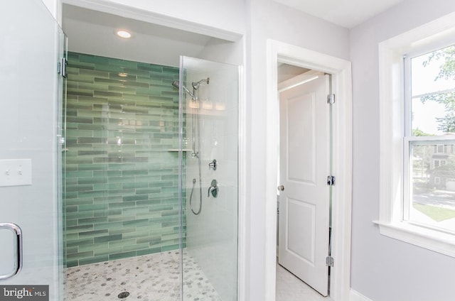 bathroom with walk in shower