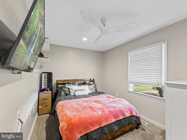 bedroom with ceiling fan and carpet