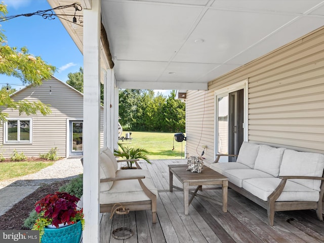 deck featuring an outdoor living space