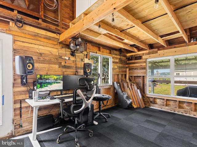 office with dark carpet and wooden walls