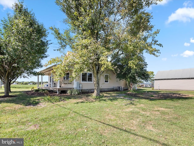 exterior space featuring central AC unit