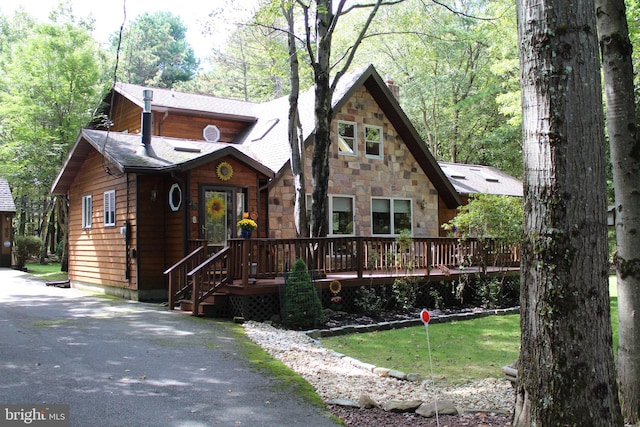 view of front of property featuring a deck