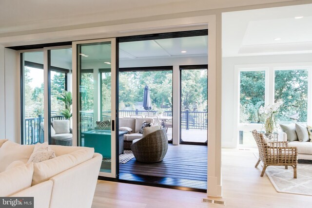 doorway to outside with hardwood / wood-style floors