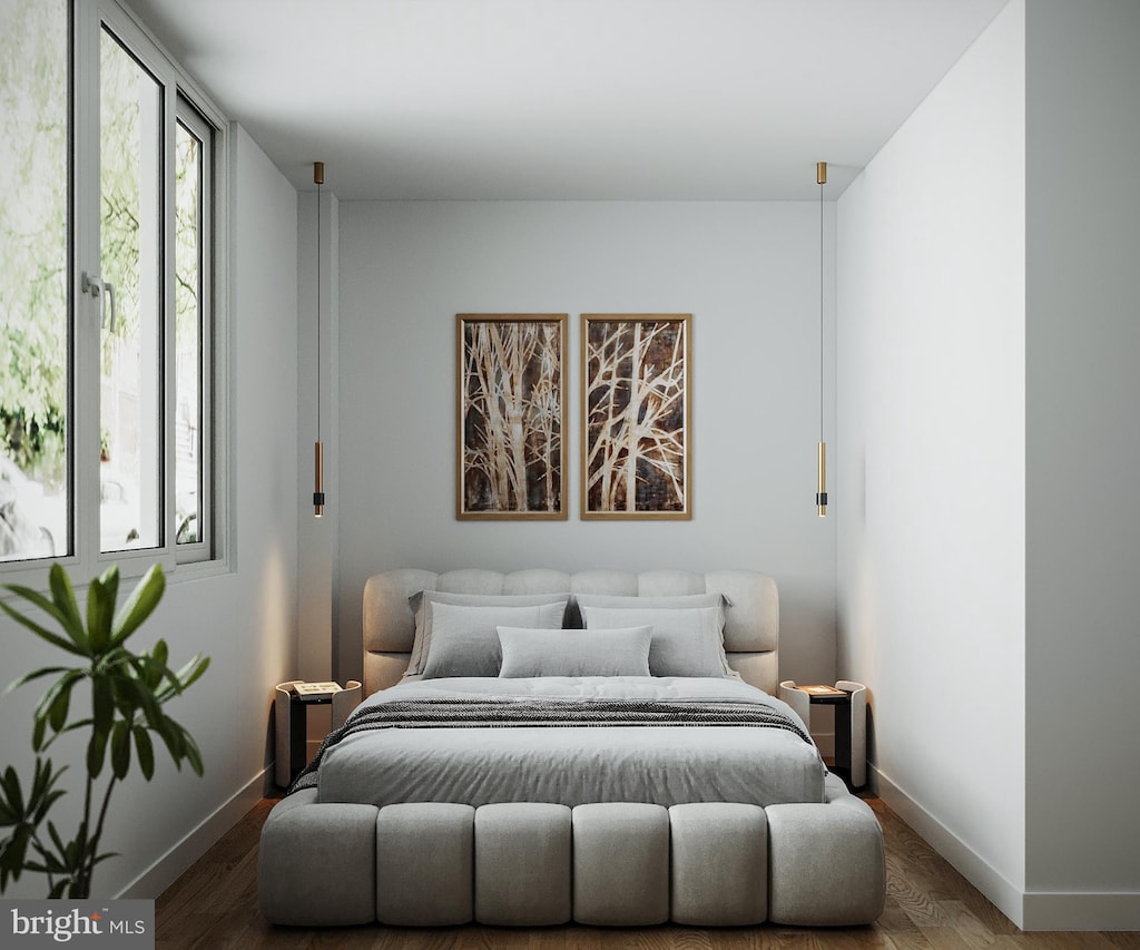 bedroom featuring hardwood / wood-style flooring